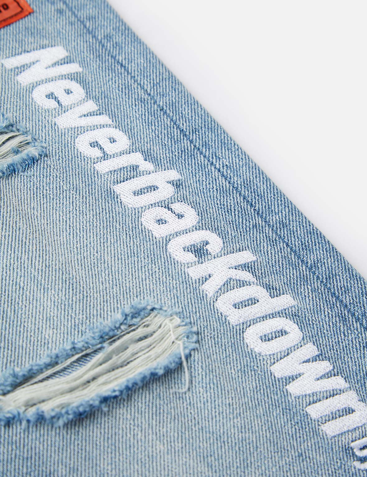 Woven Label Ripped Relaxed Fit Jeans